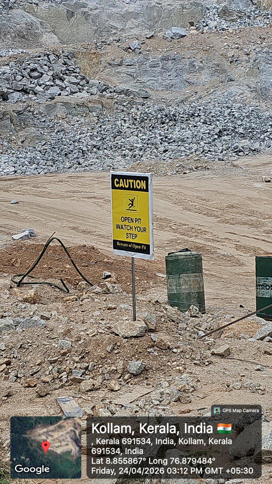 Open pit active hazard caution safety notice board on quarry floor